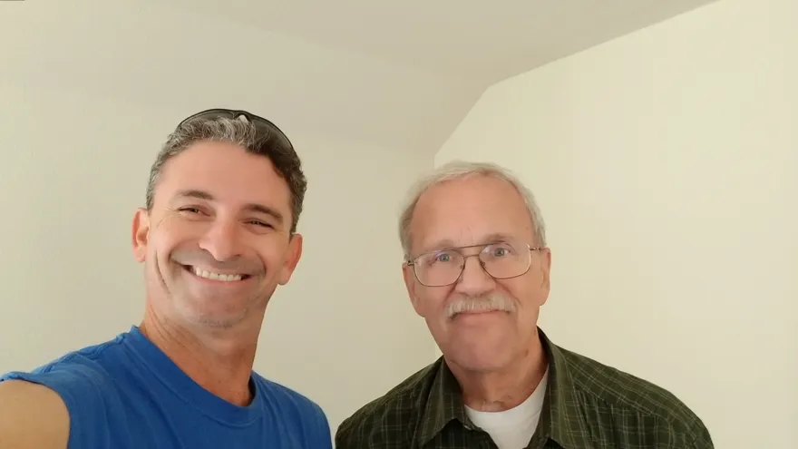 A satisfied customer with his Moving Pro Inc mover