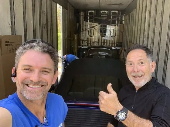 Happy Moving Pro Inc customer with her mover after the move